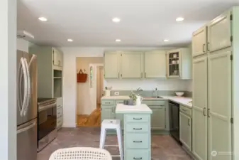 Beautifully updated paint on kitchen cabinets, hardware, lighting, flooring and appliances.