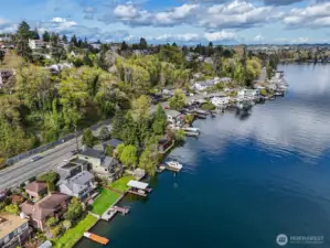 50' of coveted lake front property. Enjoy daily views of Lake Washington from every level of this unique and charming home.