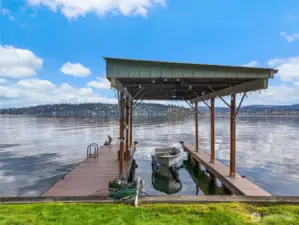 Enjoy your covered moorage and private boat lift.