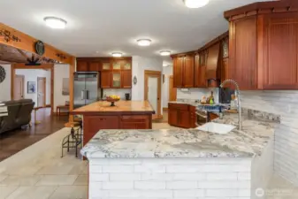 Leathered granite countertops and tile flooring.