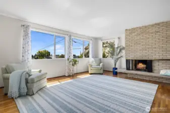 Sun-filled living room w/ fireplace!