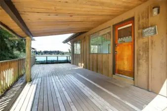 Large, covered deck looking out over the lake, perfect for BBQ's and entertaining!!