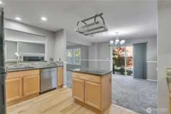 Seamless connection between kitchen and dining area.
