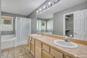 Private 5-piece bath with dual sink vanity.
