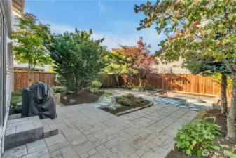 Fully fenced backyard oasis with mature landscaping is the ultimate retreat. Expansive patio ideal for outdoor entertaining