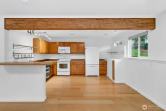 Lower unit has a full kitchen, with breakfast bar.