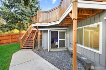 back deck stairs to lower unit. Dry storage shed below deck.