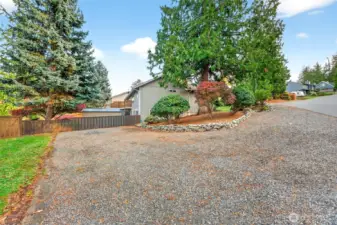 Parking off McGrath Rd for lower unit. Single level entrance. Plenty of space for your RV AND boat parking.