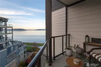 One of two private balconies. This balcony off the primary suite with sweeping views of Commencement Bay—perfect for morning coffee or evening unwinding.