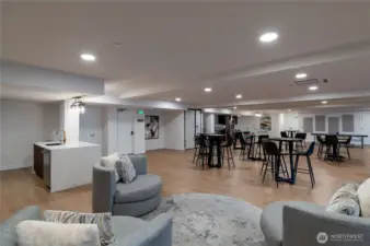 Lounge Seating + Kitchenette Area  Stylish community lounge with inviting conversation areas, wet bar, and sleek modern finishes—ideal for casual gatherings, book clubs, or quiet relaxation.