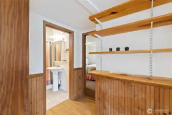 Wood accents throughout & view of the full bath ...