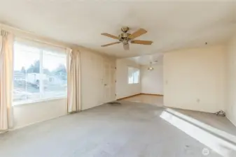 Living room looking toward entry and dining room