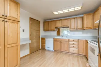 Large updated kitchen. Door opens to the attached 2-car garage.