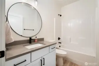 Guest Bathroom - Pics are of a different 2014 plan. Features and colors may differ.