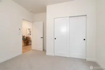 Guest Bedroom (Bedroom #2 on Floorplan) - Pics are of a different 2014 plan. Features and colors may differ.