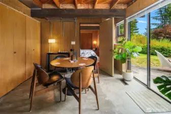 The fireplace wall is now behind us and we're looking toward the 3rd bedroom with the slider on our right opening to the backyard.  The doors on the left open to side-by-side laundry closet.