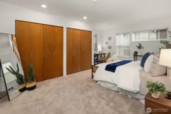 Generous primary suite with plenty of closet storage