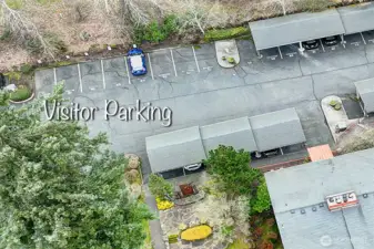 An EV charging station is available within the community ...and there's plenty of visitor parking nearby too!