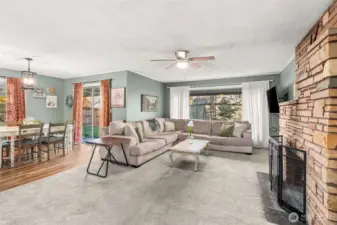 Spacious living room and dining area - kitchen to the left