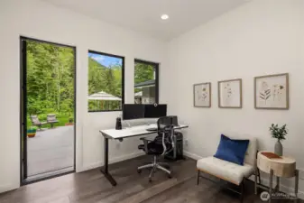 Main floor office that opens to back patio.  Working from home has never been so pleasant.