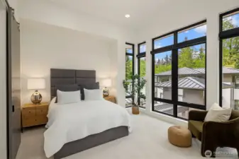 Each of the three bedrooms is generously sized and en-suite, providing ample comfort and privacy for family and guests alike.