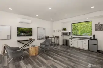 The ADU is ideal for working from home, your favorite hobbies, or extended family and guests.  This self-contained living space includes a kitchenette, living area, studio and ½ bath and private entrance — offering both convenience and flexibility.  Plumbing is in place to add a shower.