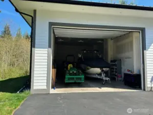 Oversized 6 car garage with tall entry to park an RV, boats and all your toys!