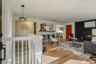 Enter to a spacious living room with access to the kitchen, dining room and patio.