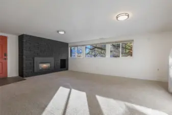 Downstairs family room with gas fireplace