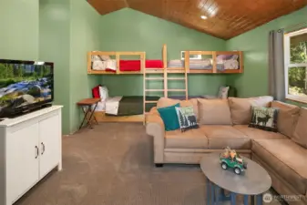 Another view of family/living room with plenty of extra sleeping space for everyone! Built in bunk beds and all bedding included!