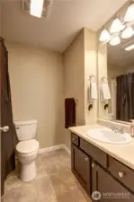 Master bedroom /Primary bedroom bath.  3/4 bath with shower. New sink and newer toilet.