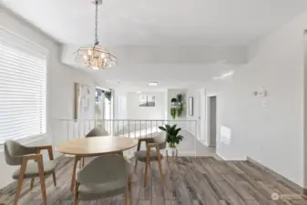 The breakfast nook, flowing to the spacious family room.