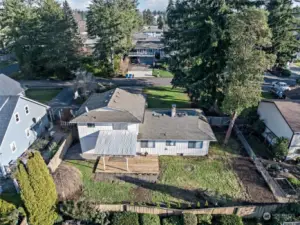 The fully fenced yard keeps the things you love safe. Covered deck allows a dry outdoor space all year long, NICE!!