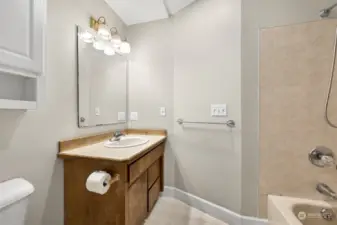 Guest bathroom with tub