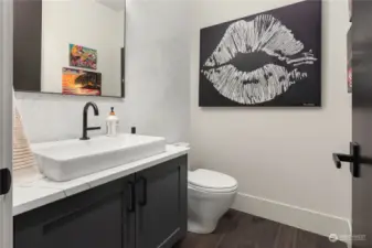 A half bath off of the flex space adds convenience