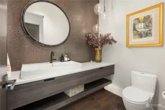 Main floor powder room is stunning.