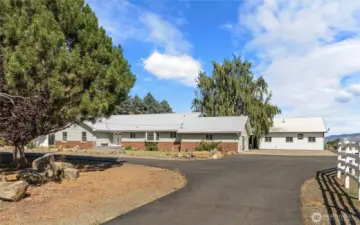 Paved circle driveway for easy maneuvering of vehicles!
