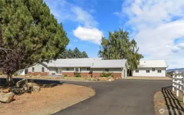 Paved circle driveway for easy maneuvering of vehicles!