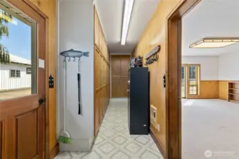 Mechanical room and storage off of the bonus room. It is full of pantry cupboards so there is storage for everything from winter gear to Costco stock up supplies - it all fits!