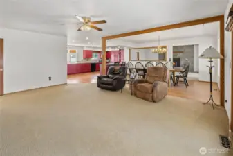 The family room off the dining and kitchen is another great space to hang out!  There are doors to the back deck and yard!