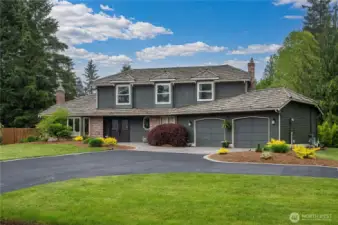 Beautifully updated Brook Trails home positioned on a sun drenched lot and designed for indoor / outdoor entertaining.