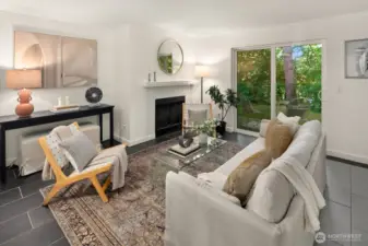 Open living/dining/kitchen w/ slider opening to patio & yard space
