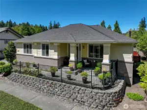 An expansive covered front porch is a nice place to enjoy your morning coffee.