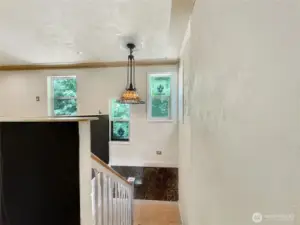 Stairs down to first floor