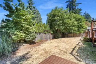 Backyard with multi-level deck and storage shed