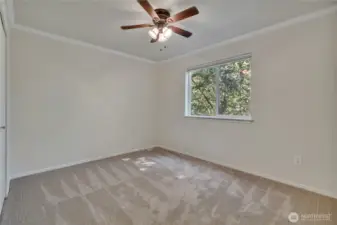 3rd bedroom on the upper level, with ceiling fan ~