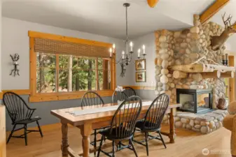 Dining area with mountain views and abundant natural light.