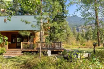 Mountain backdrop – Sweeping views of the North Cascades frame the property, with mature evergreens offering both privacy and beauty.