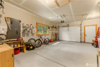 Garage space – Oversized attached garage with plenty of storage for vehicles, bikes, and outdoor gear.