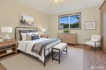 2nd bedroom with double closets makes for a great guest room, den, office, etc.  Virtually staged photo